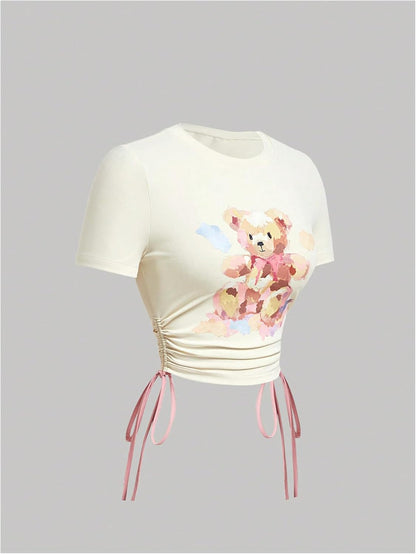 Women's Cartoon Bear Print Crop T Shirt Tie Side Ruched Tee Shirt Short Sleeve Crew Neck Top Apricot X-Small at Amazon Women's Clothing store