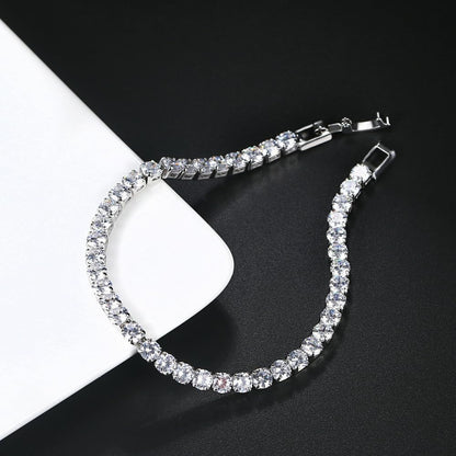 Moissanite Tennis Bracelet 4-Prong Dainty 2.5-4mm Size 8 Cubic Zirconia | Lab-created moissanite tennis bracelet with 4-prong CZ setting. dainty 2.5-4mm stones. size 8. golden-tone finish. brilliant